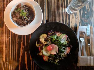 Cast iron socca and the side of mushrooms. at XYST in New York City