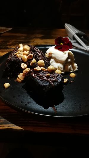 CHOCOLATE CAKE. ORANGE BLOSSOM GELATO. CANDIED WALNUTS. USD13 at XYST in New York City