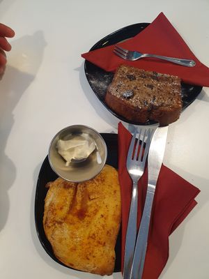 Banana bread and pepperoni calzone with mayo at Hillgate Cakery in Stockport