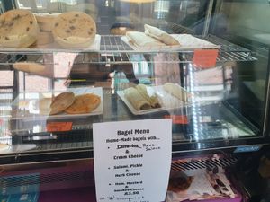 Selection of savoury goods. Pie, burrito, calzone and sausage roll at Hillgate Cakery in Stockport