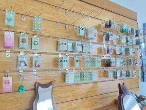 Earrings and pins  at Lucky Cat Cafe in Annerley