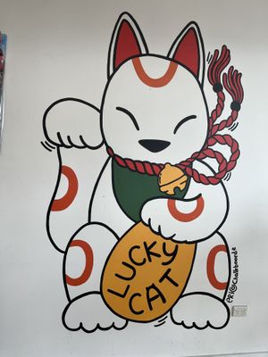 Cute wall art   at Lucky Cat Cafe in Annerley