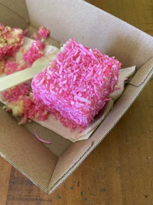 Pink vegan lamington  at Lucky Cat Cafe in Annerley