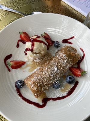 Apple cake with vanilla ice cream and biscoff cream  at Comptoir V in North West London