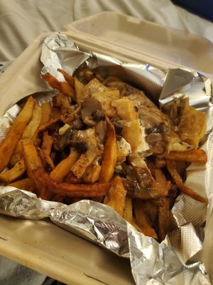 The poutine: fries with fried tofu, cashew cheese, and mushroom gravy at Three Carrots - Fountain Square in Indianapolis
