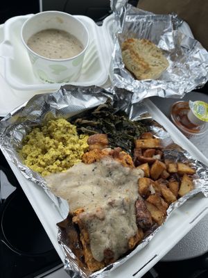 Country Breakfast and Half Biscuit with gravy  at Three Carrots - Fountain Square in Indianapolis
