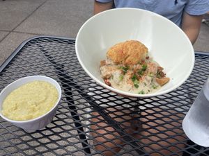 Loaded biscuits and gravy with grits  at Three Carrots - Fountain Square in Indianapolis