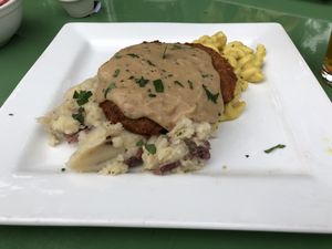 Country Fried Seitan Steak over Mac n Cheese  at Three Carrots - Fountain Square in Indianapolis