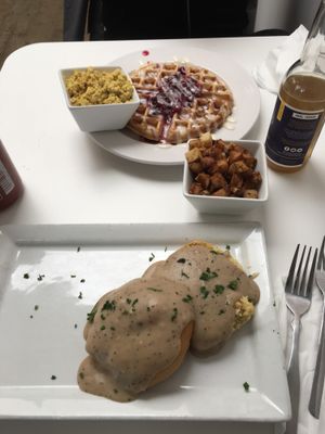 Biscuit & gravy, sweet waffle, tofu scramble, and roasted potatoes at Three Carrots - Fountain Square in Indianapolis