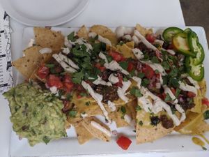 Not-chos. Delicious cheez sauce. at Three Carrots - Fountain Square in Indianapolis