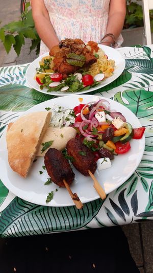 "talerz wakacyjny" i "schabowy" at Kuchnia PoWolność in Poznan