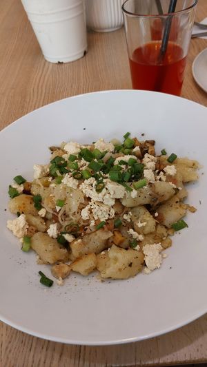 szare kluski / dumplings with sauerkraut and tofu at Kuchnia PoWolność in Poznan
