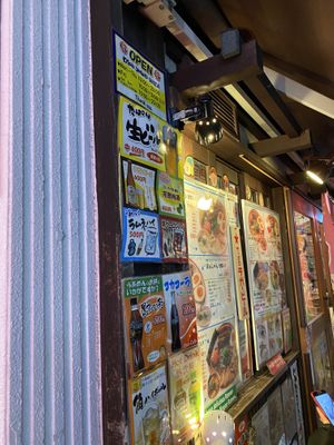 Front door. Their name is in the sign that says "Open". at Kyushu Jangara Ramen - Ginza in Tokyo