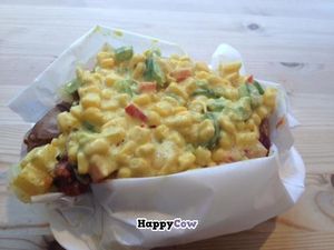 Baked potato with vegan chili and curry corn at The Baked Potato Shop in Edinburgh