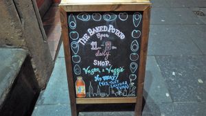Shop front board at The Baked Potato Shop in Edinburgh