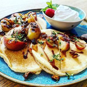 Vegan pancakes with grilled peaches and cream  at Plant B in Antwerpen