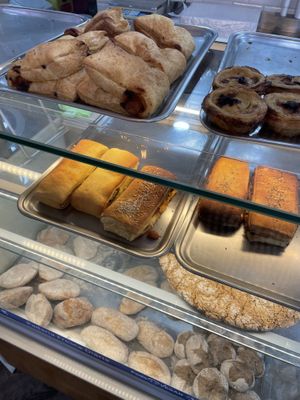 Some salty options and pastel de nata on top at Padoca Vegan - Fábrica in Vila Nova De Gaia