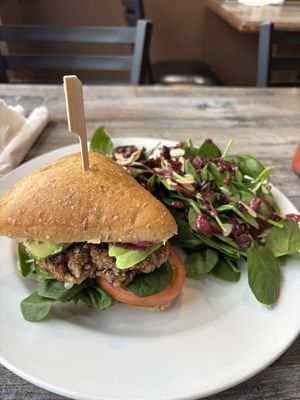 Vegan burger with side spinach salad $22  at The Food and Art Cafe in Whitby