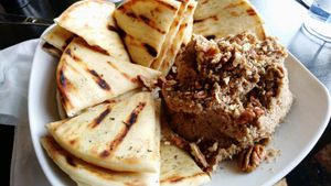 Big pâte and pita plate at Feed the World Cafe in Kalamazoo