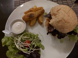 Khao soi burger and fries at Goodsouls Kitchen in Chiang Mai