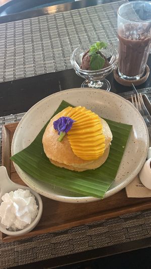 Banana pancakes with mango, syrup, cream & ice cream and an iced chocolate   at Goodsouls Kitchen in Chiang Mai