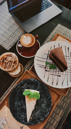 Carrot and cream cake (135 THB), Chocolate Lover cake (135 THB), Cappuccino, regular w/ coconut milk (70 THB), Iced caramel macchiato w/ coconut milk (85 THB)  at Goodsouls Kitchen in Chiang Mai