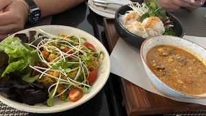 Tofu scramble; a spicy vermicelli tomato soup   at Goodsouls Kitchen in Chiang Mai