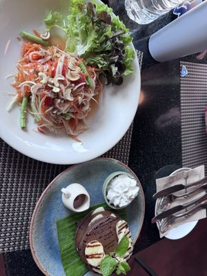 Papaya salad and chocolate banana pancakes   at Goodsouls Kitchen in Chiang Mai