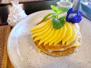 Banana pancakes with mango  at Goodsouls Kitchen in Chiang Mai