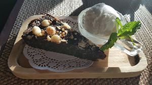 The best raw vegan brownie along with fresh coconut ice cream with chunks of coconut inside. Life changing... at Goodsouls Kitchen in Chiang Mai