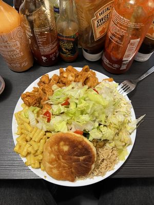 Amazing Mac and cheese and southern fried jackfruit. The portion is so huge you can’t see the amazing lentil, spinach, and sweet potato curry underneath the saladd  at Deserted Cactus in South East London