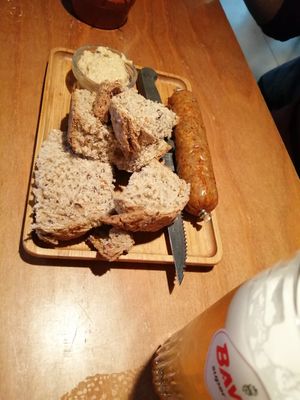 Seitan worst with mustard at Het Strand - The Strand in Leuven