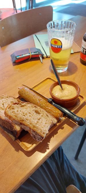 Seitan sausage with bread and mustard at Het Strand - The Strand in Leuven