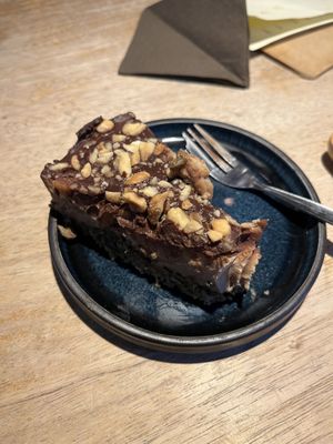 The peanut-chocolate cheesecake is delicious!   at Het Strand - The Strand in Leuven