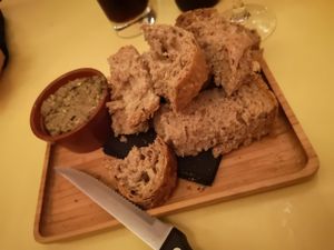 Fresh bread with Olive tapenadas at Het Strand - The Strand in Leuven