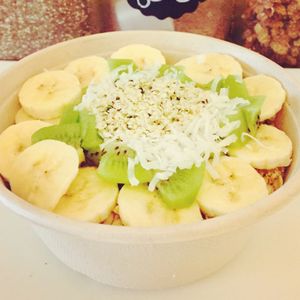 Green acai bowl! Acai with kale and spinach topped with granola, bananas, kiwi, coconut flakes, hemp seeds. at Four Oaks Cafe and Juice Bar in Southampton