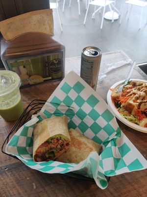 Pulled Jack wrap, banana mango smoothie, and Caesar salad at Grounded for Life Cafe in Clinton