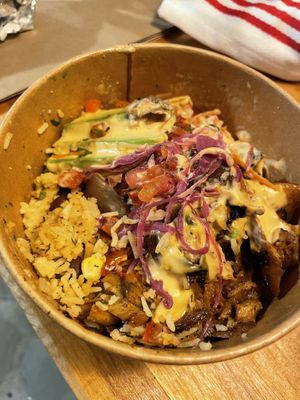 Seitan Lover Bowl- huge portion and very spicy sauce   at Grounded for Life Cafe in Clinton