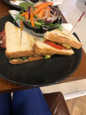 Vegan toastie w/ avocado + tomato   at Whispers Cafe in Parramatta
