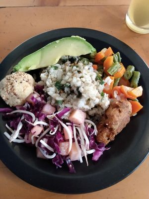 Salad, croquet, rice with peanuts, puree of garbanzos with sesame seeds on top, slice of avocado, mixed cooked veggies at El Arbol de la Vida - Maybe closed in Medellin