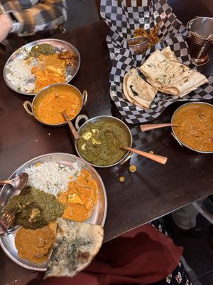 Sharing three different types of curries, two different types of naan, and some rice.   at Shandhar Hut in Chilliwack