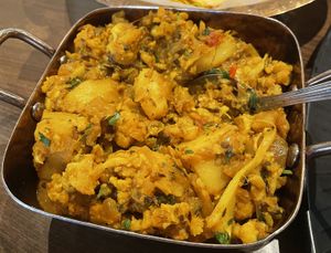 Vegan/Gluten free Aloo Gobi, cauliflower and potatoes cooked in a nice curry mix. Served with basmati rice.   at An Indian Affair in Langley