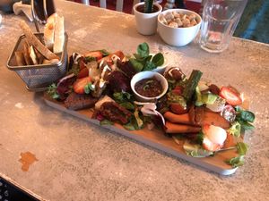 Tapas round 3 - huge mezze of various items such as deli meats, pate, chutney, cream cheese, pesto and fruit and salad at Sundowners in Exmouth