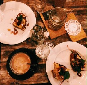 scrambled egg toast with almond cappuccino at Kuddelmuddel Cafe  in Berlin