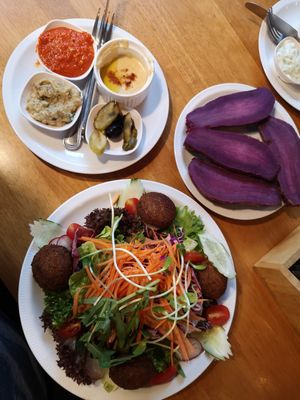 Falafel salad with harissa, babaganoush, olives and cucumber with extra steamed sweetpotatoes at The Falafelist in Chiang Mai