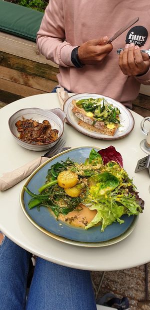 Potato and leaves salad (amazing), side of tamari mushrooms, bread with cabbage... delicious! at W6 Garden Centre Cafe in West London
