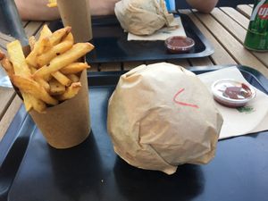 The meal - fries, homemade ketchup, burger and drink   at O'Local Restaurant in Brest