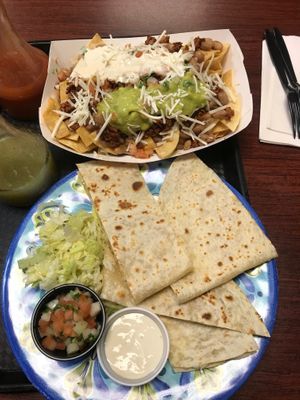Supreme nachos with chorizo and chicken quesadilla  at Veganos Kitchen in Las Vegas