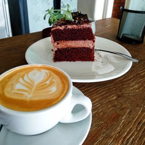 Chocolate cake and soy latte at Alchemy Vegan in Chiang Mai