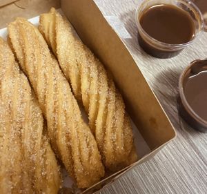 Churros for two with caramel and chocolate sauce  at Alchemy Vegan in Chiang Mai